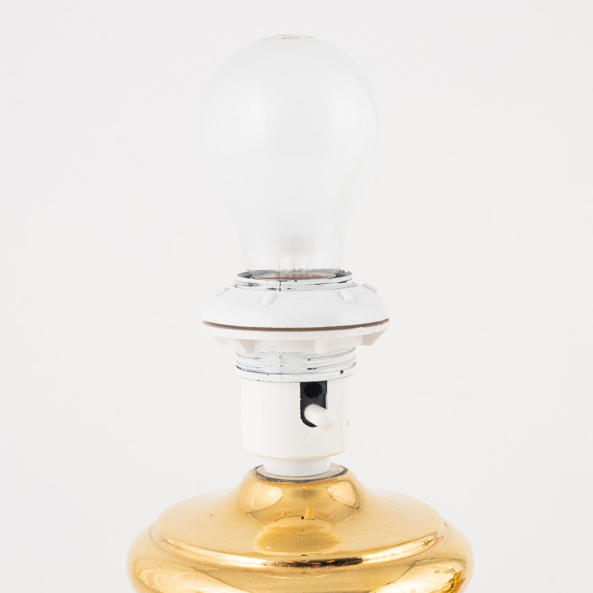 A pair of ceramic table lamp, Italy, second half of the 20th century.