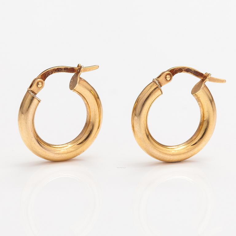 A pair of 14K gold earrings. Italy.
