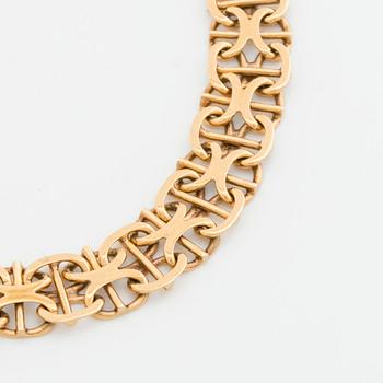 ARMBAND 18K guld x-länk med stav, Stockholm 1968.