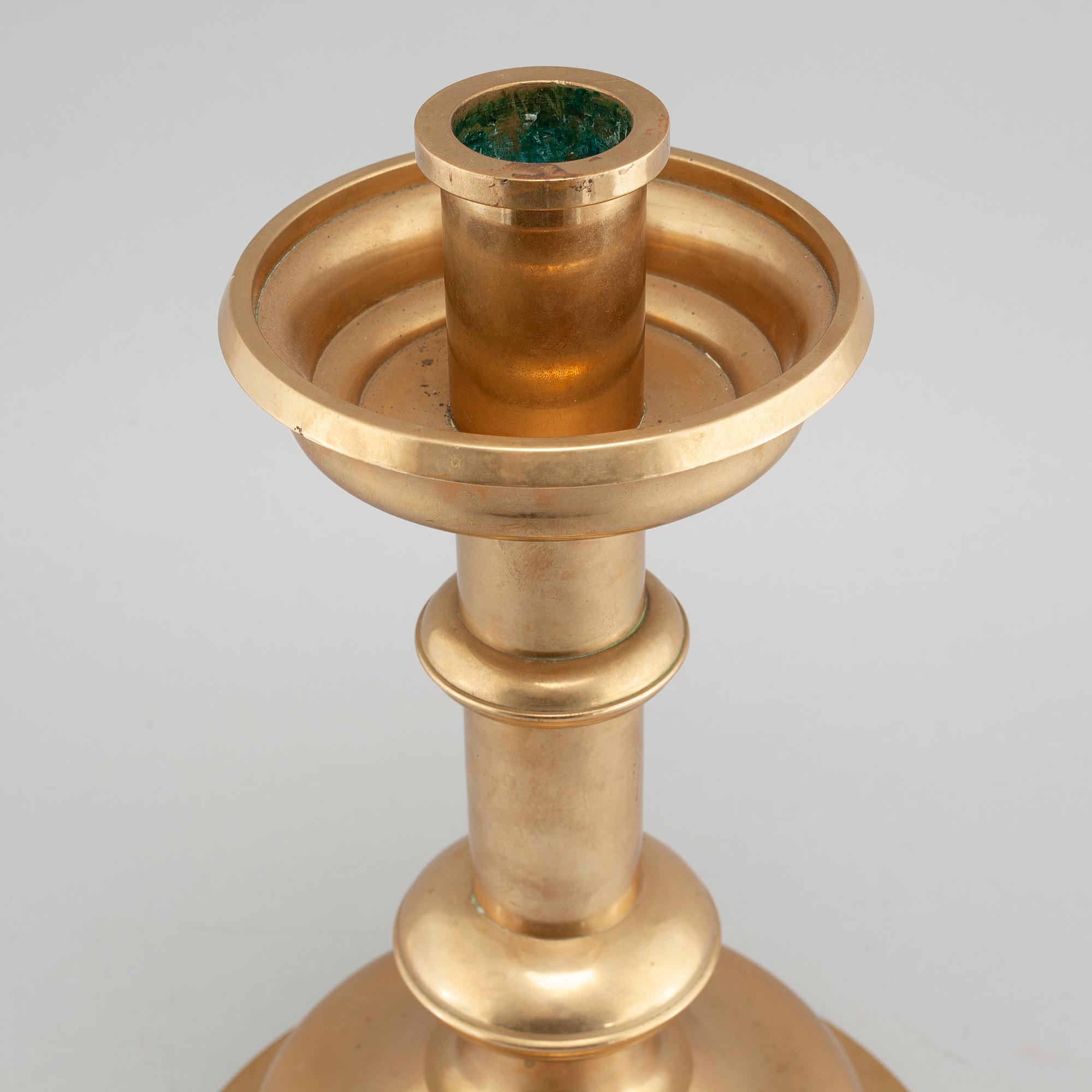 A brass candlestick by Erik Jonsson, Skara from the second half of the 20th century.
