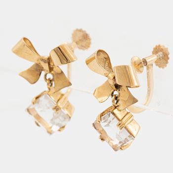 A pair of 18K gold earrings with faceted rock crystal.