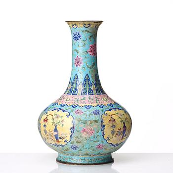 An enamel on copper vase, Qing dynasty, circa 1800.