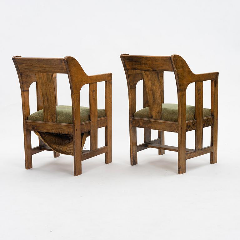 Carl Westman, probably, a pair of stained birch Art Nouveau easy chairs, Sweden ca 1900.