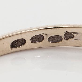Ring, three brilliant cut diamonds, 18K white gold, H. Lahtinen & Co., 1985.