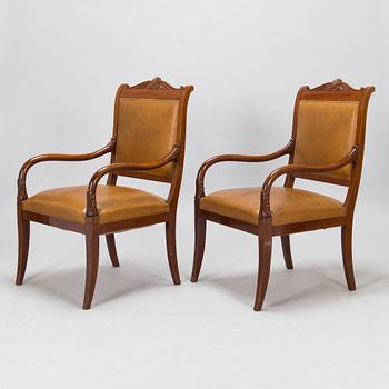 A pair of armchairs, possibly Boman, around 1900.
