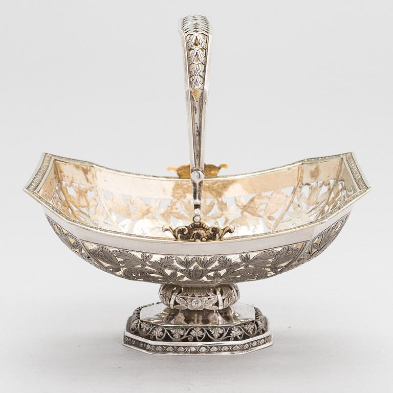 A Russian, parcel-gilt silver swing handle basket, Moscow 1834.