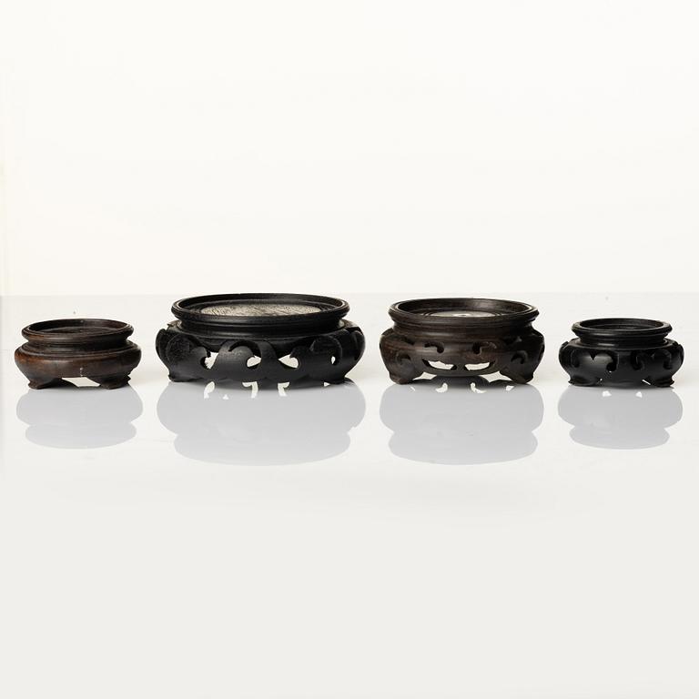 A group of Chinese wooden stands, late Qing dynasty and 21st century.