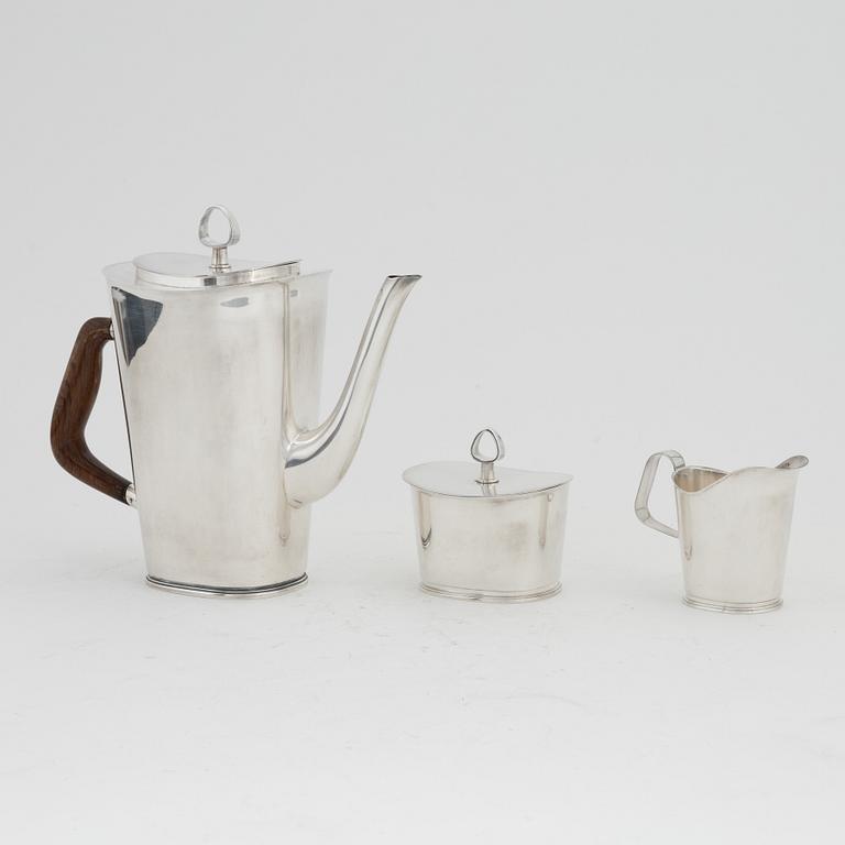 Vera Ferngren, a silver coffee pot, a lidded sugarbowl and a creamer, GAB, Stockholm, 1964-1965.