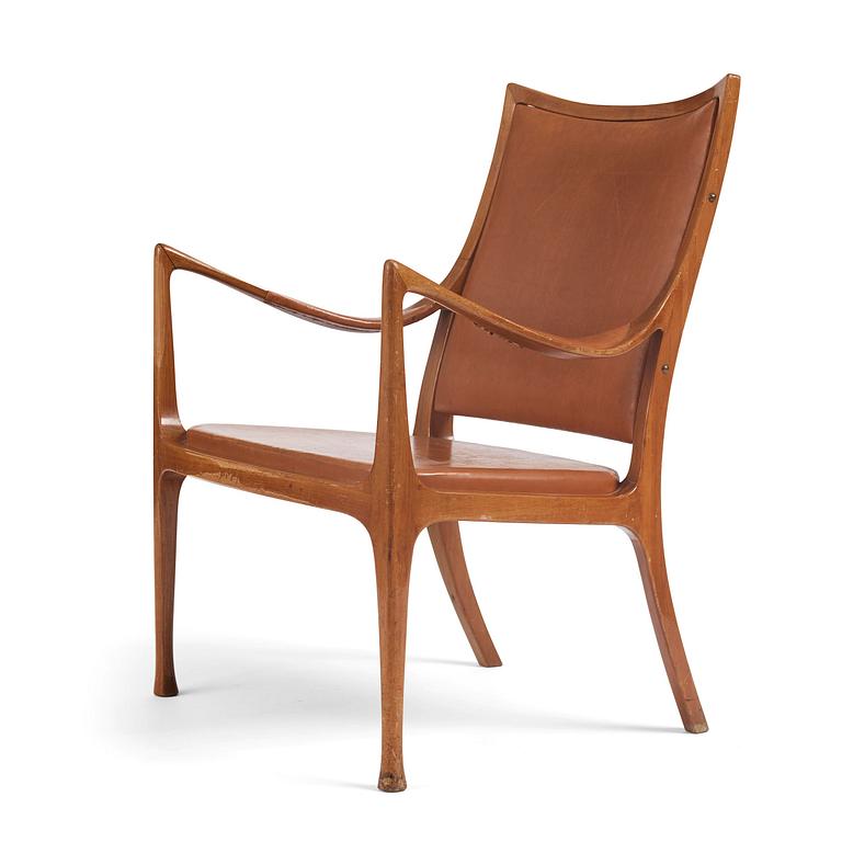 Hans Asplund, a walnut and leather easy chair, Nordiska Kompaniet, ca 1955, for the Nordiska Kompaniet beauty salon.