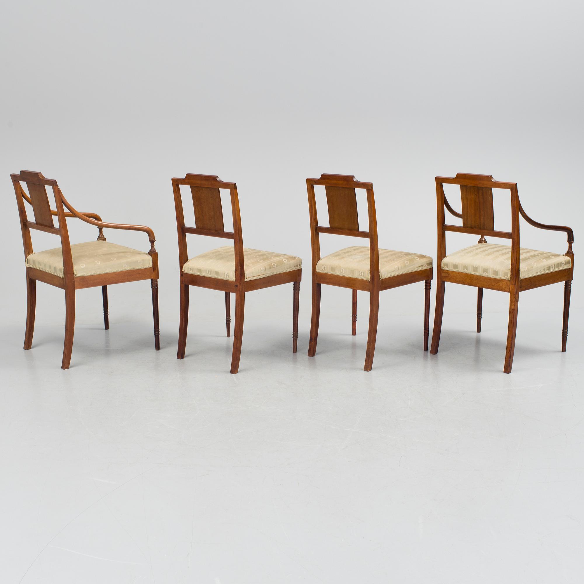 A 1920/30s Swedish Grace sofa, a pair of chairs, a pair of armchairs and a table veneered with mahogany.