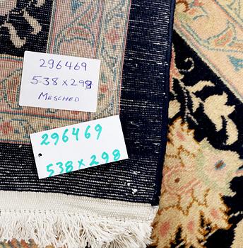 A Meshed carpet, c. 538 x 298 cm.