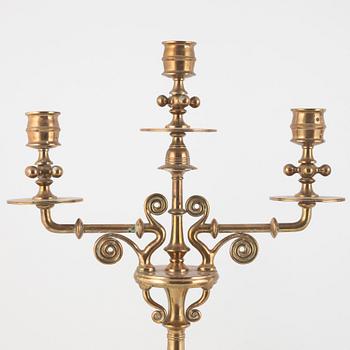 A pair of brass candelabra, Gusums Bruk, circa 1900.