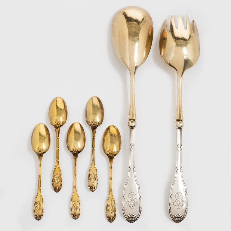 A pair of silver salad cutlery and five coffee spoons, mark of Georges Fouquet-Lapar, France (active 1897-1925).
