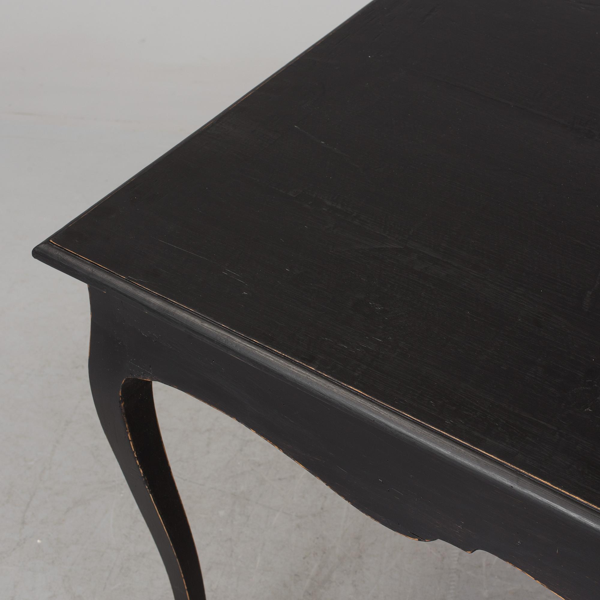 A partially rococo, 18th century writing desk.
