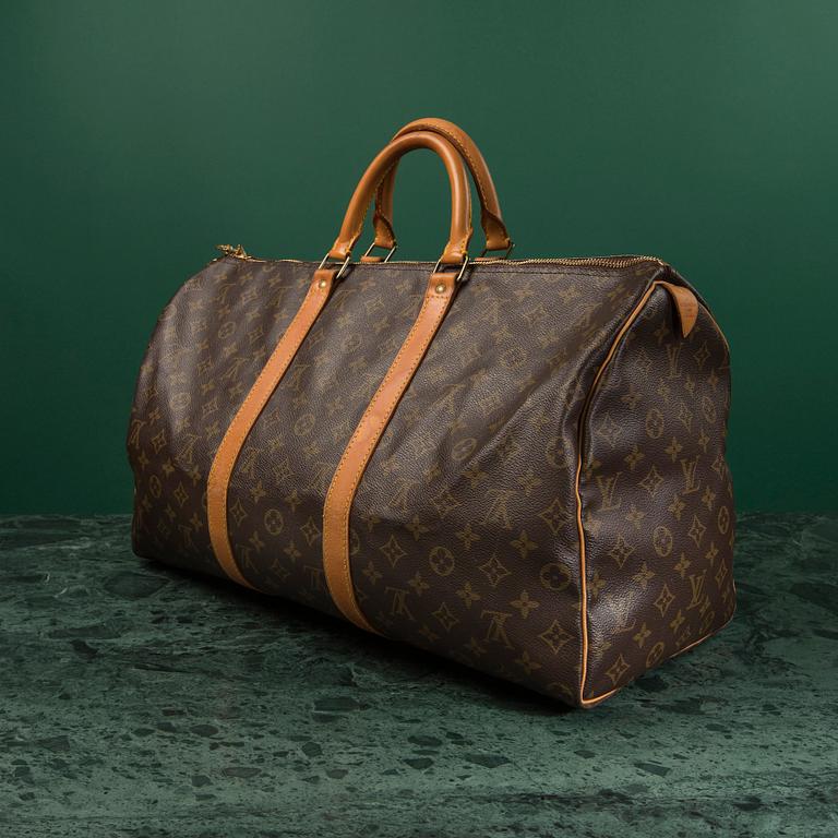 A monogram canvas weekendbag "Keepall 50" by Louis Vuitton.