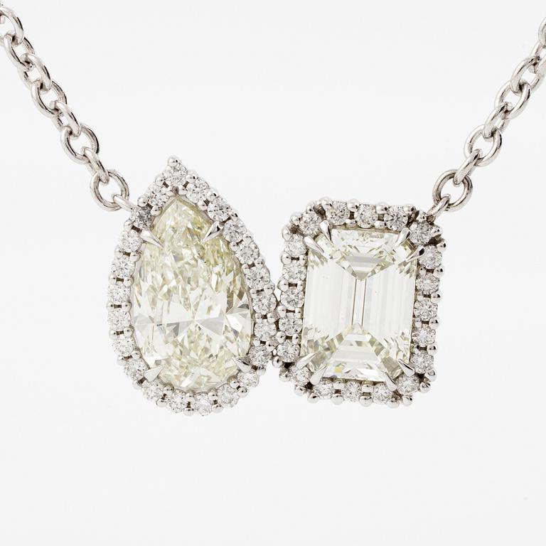 Necklace 18K white gold with pear-shaped and emerald-cut diamond accompanied by IGI and GIA report.