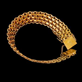 ARMLÄNK, 18K guld, Mary Kvochs guldsmedsatelje,  Stockholm, 1957. Vikt 35,4 g.
