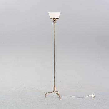 A model 2424 up light by Josef Frank for Firma Svenskt Tenn.