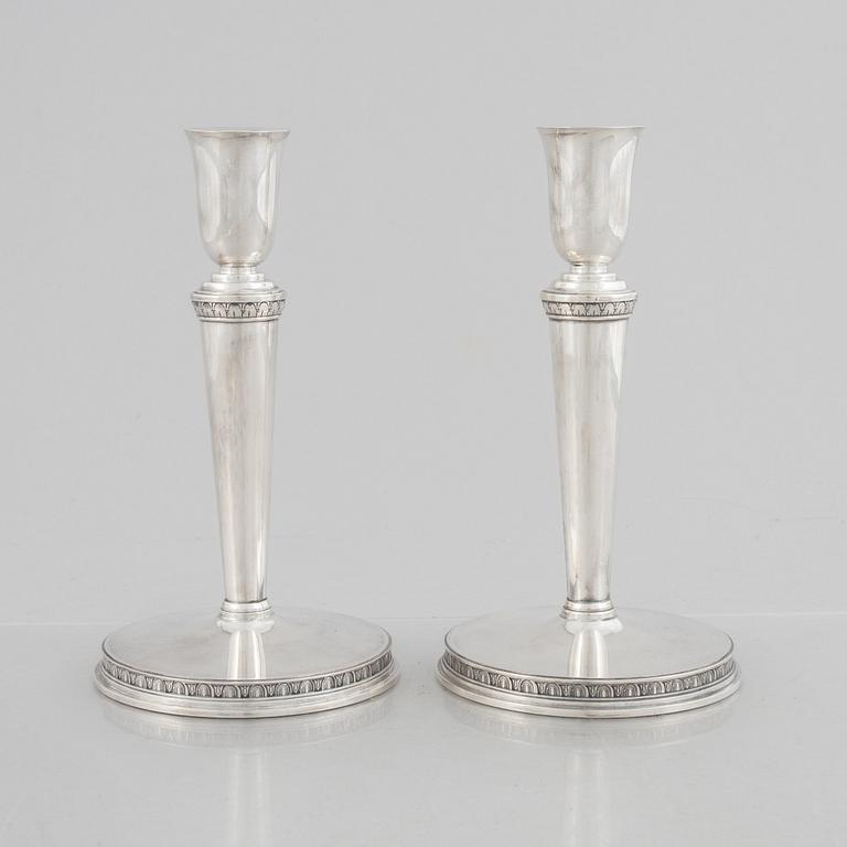 Eric Råström, a pair of silver candlesticks, Råströms Silver- O Nysilverfabrik , Stockholm 1957.