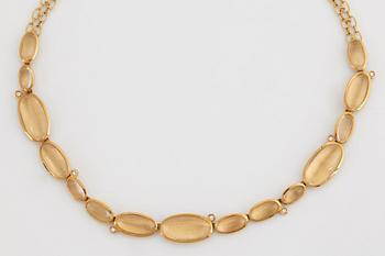 Collier Stern "Justine" 18K guld med cabochonslipad bergkristall och runda briljantslipade diamanter.