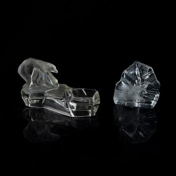 Nine glass polar bears.
