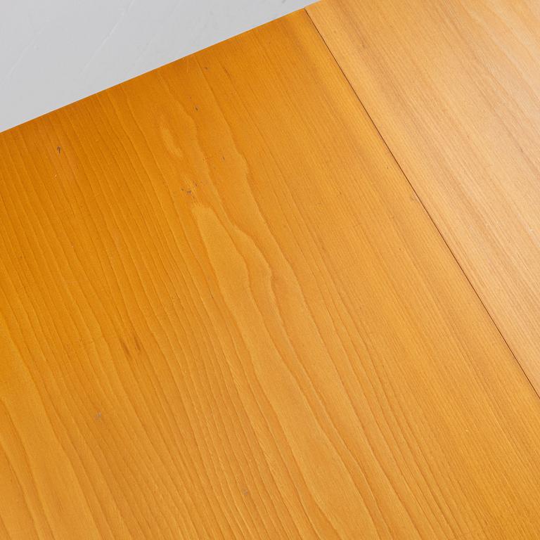 An elm-veneered dining table, Nordiska Kompaniet, Sweden, 1955.