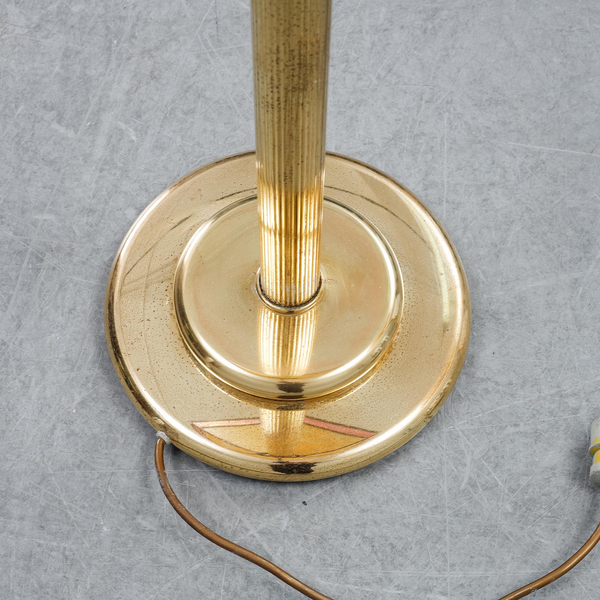 A pair of lamps, second hanf of the 20th Century.