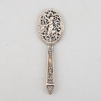 Goblet on foot, hand mirror, and box, silver.