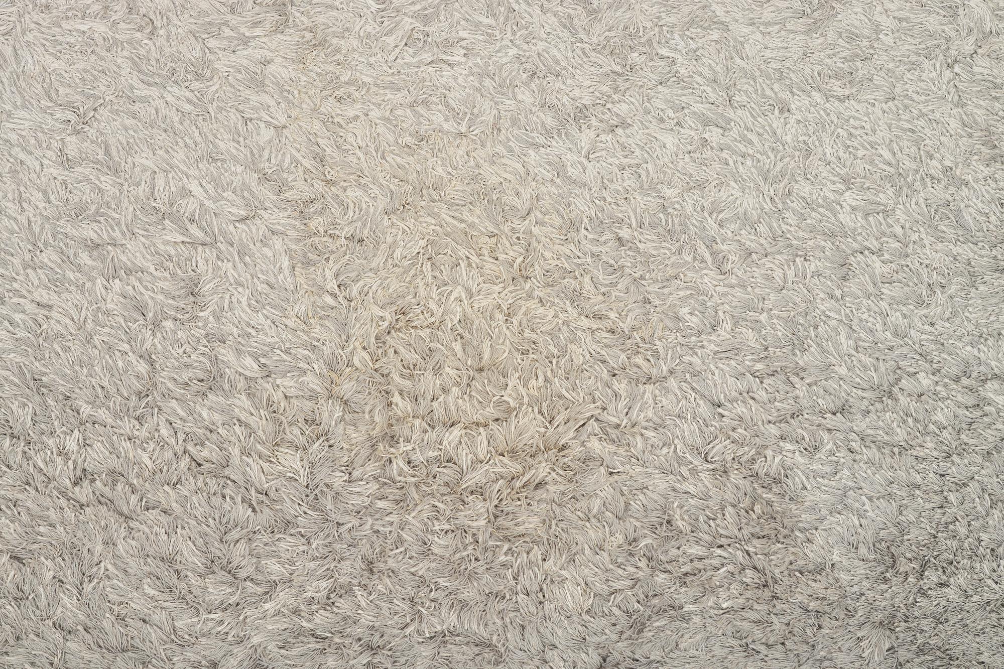A tufted 'Wisp Rainbow Cenere' carpet, Minotti, Italy, c. 550 x 400 cm.