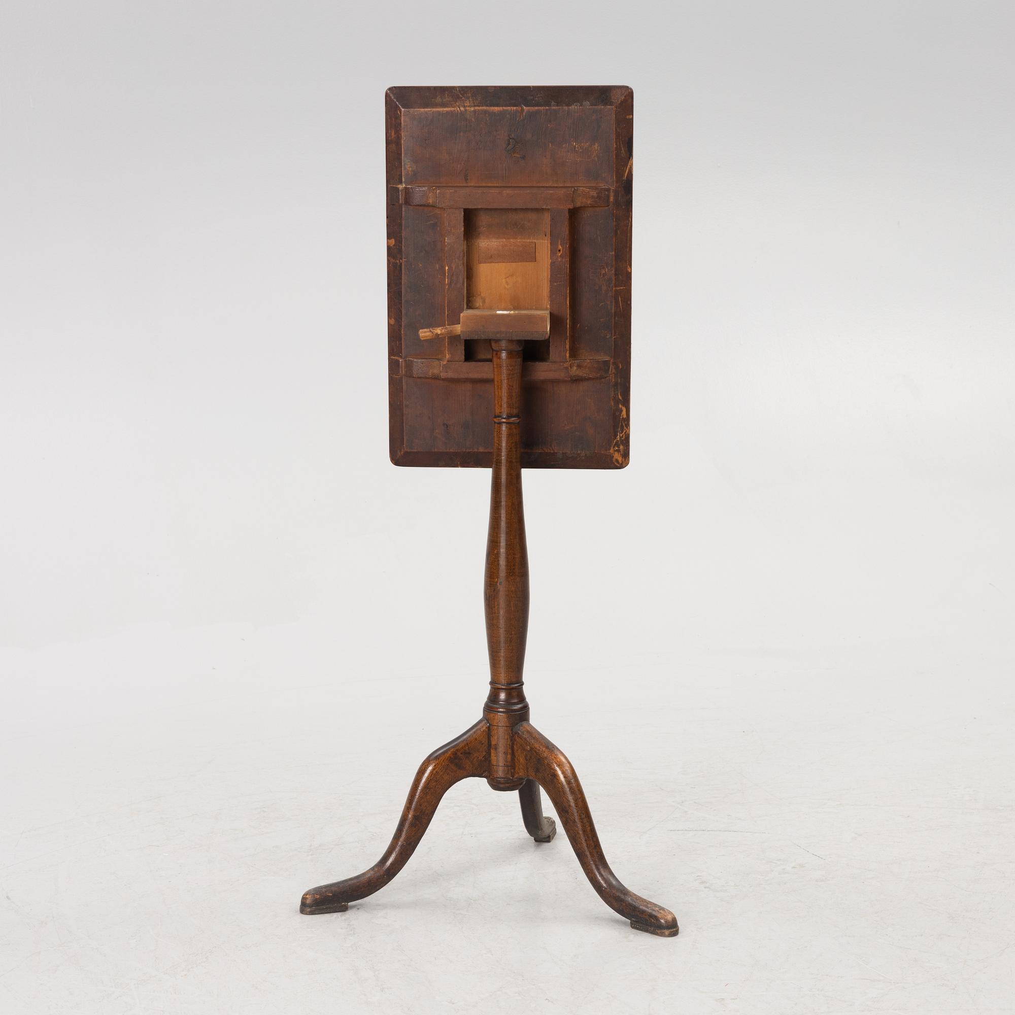 A folding table, early 19th century.