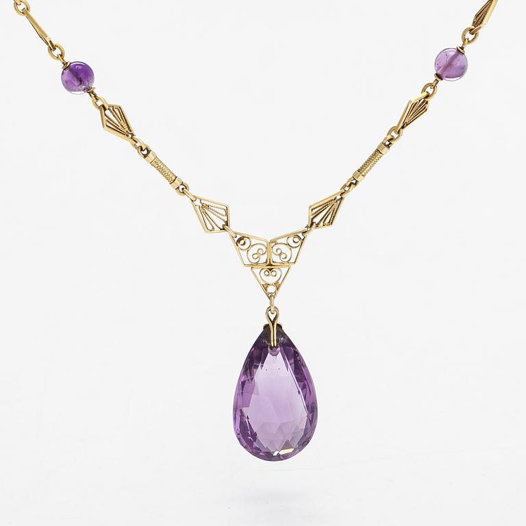 A 14K gold and amethyst neckalce.