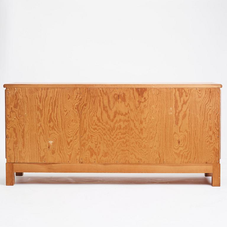 Oscar Nilsson, attributed to, a Swedish Modern oak sideboard, Sweden 1940s.
