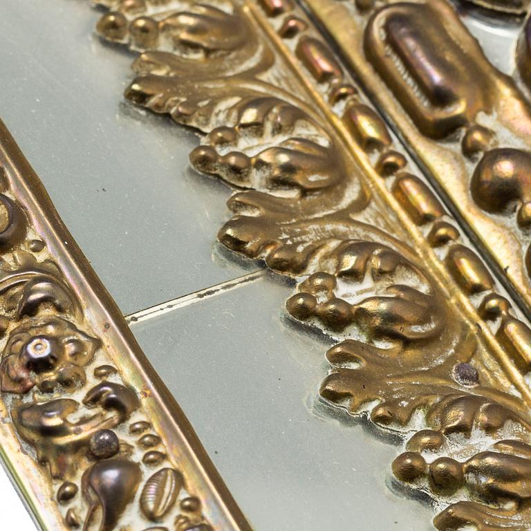 An early 20th Century pair of baroque style mirror sconses.