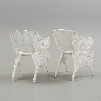 A pair of garden chairs by Melins, Anderstorp.