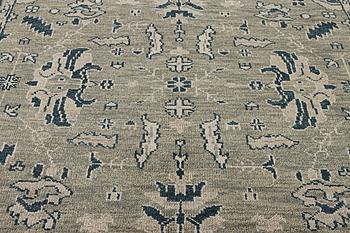 An oriental carpet with Mamluk design, ca. 372 x 277 cm.