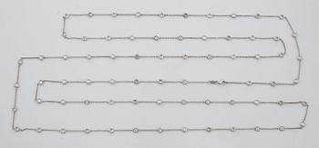 A brilliant cut diamond necklace.