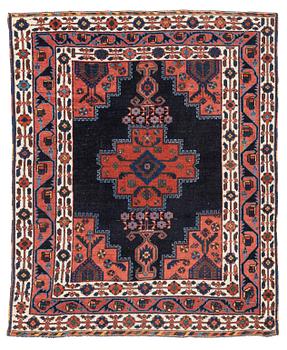 357. An antique Afshar rug, c 135 x 109 cm.