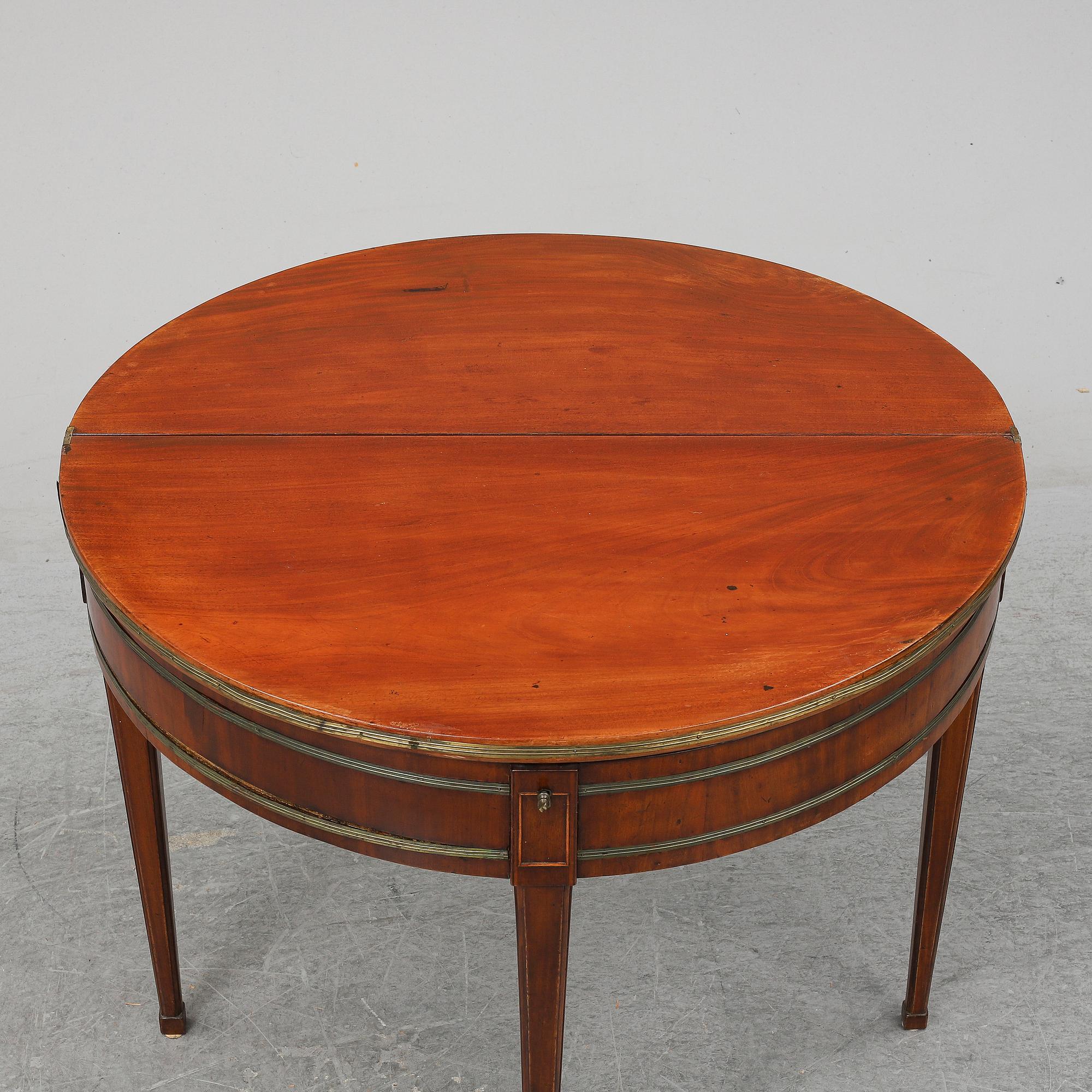 A Directoire games table.
