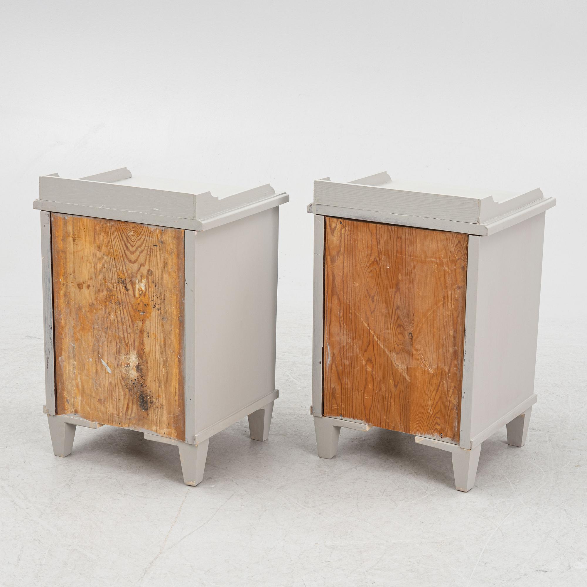 A pair of bedside tables, later part of the 20th century.