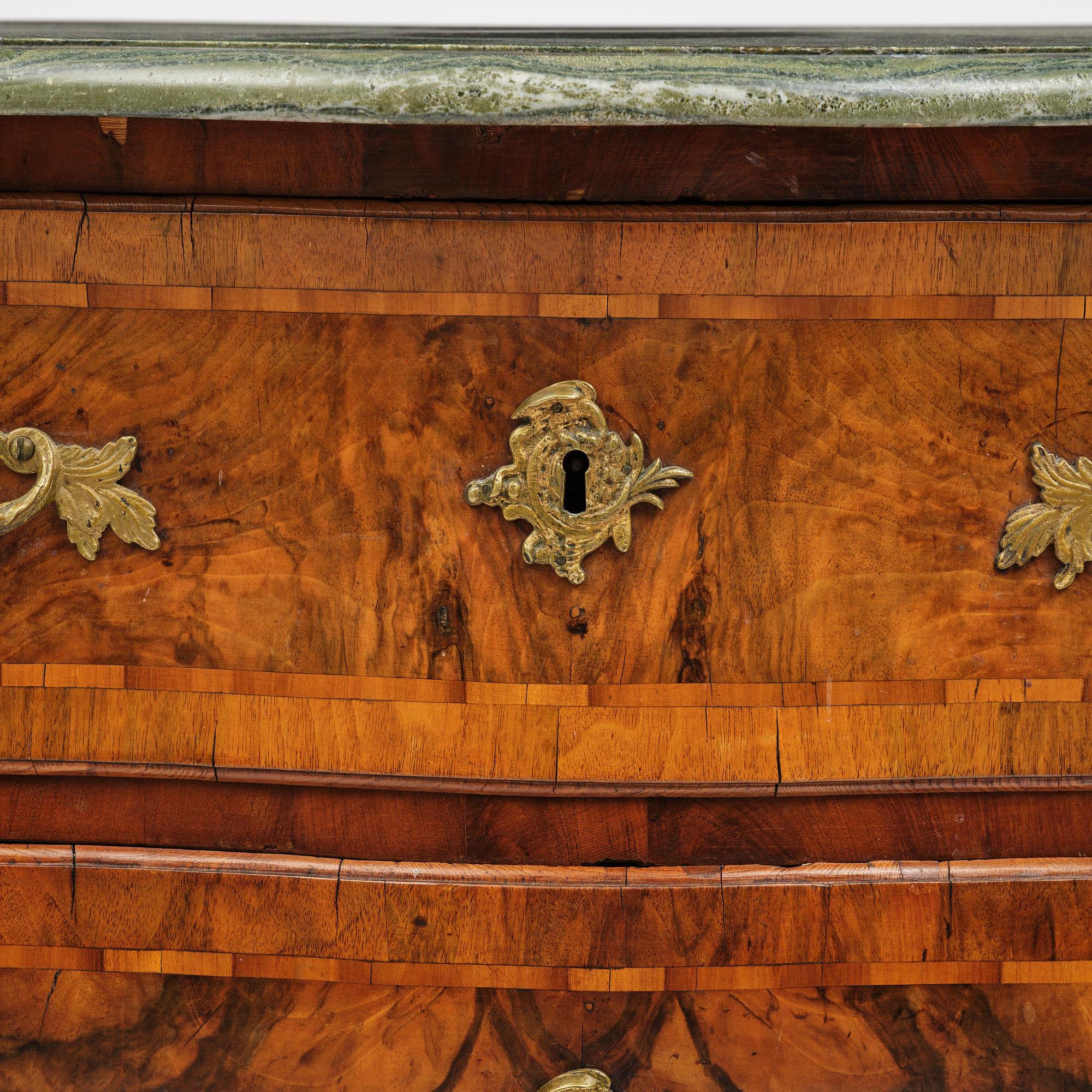 A Swedish rococo parquetry commode by C. Linning (master in Stockholm 1744-79).