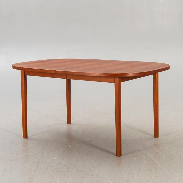 A 1960s/70s teak dining table.