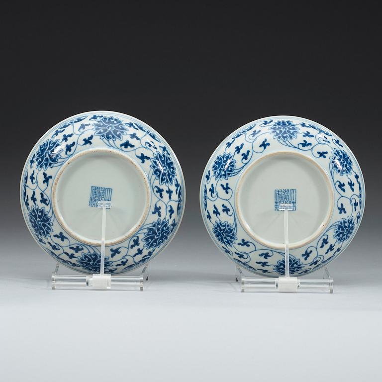 A pair of blue and white lotus dishes, Qing dynasty, 19th century with Daoguang seal mark.