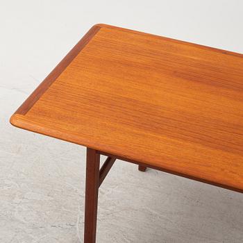 A teak veneered coffee table, Scandinavia, 1950's/60's.