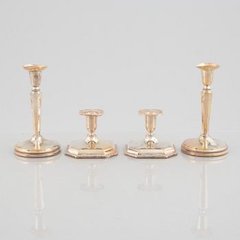 Two pairs of silver candlesticks, including Eric Löfman, MEMA, Lidköping 1994.