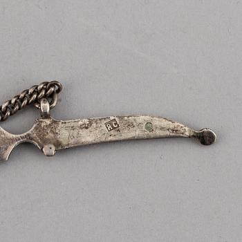 A Russian silver and niello bracelet and two belt buckles, unidentified makers mark, Kiev 1896-1908 and other.