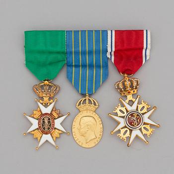 Three medals one of the Sankt Olov order, one of the Vasa order and one from the Swedish army.