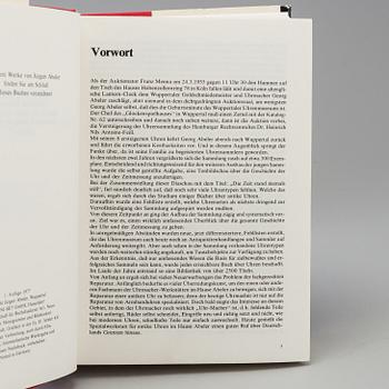 A set of 6 watch books.