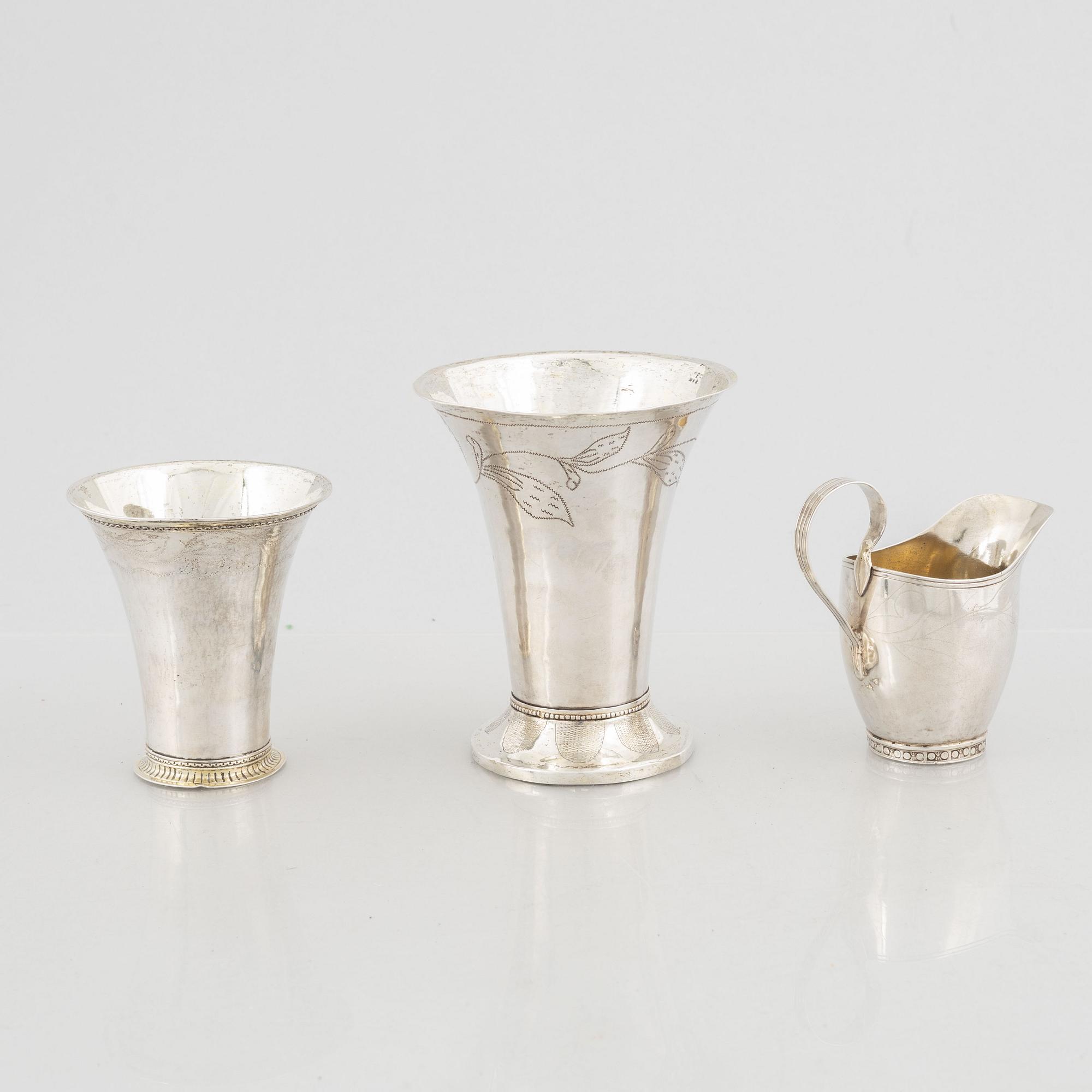 Two silver beakers and a silver creamer, 19th century, Finland.