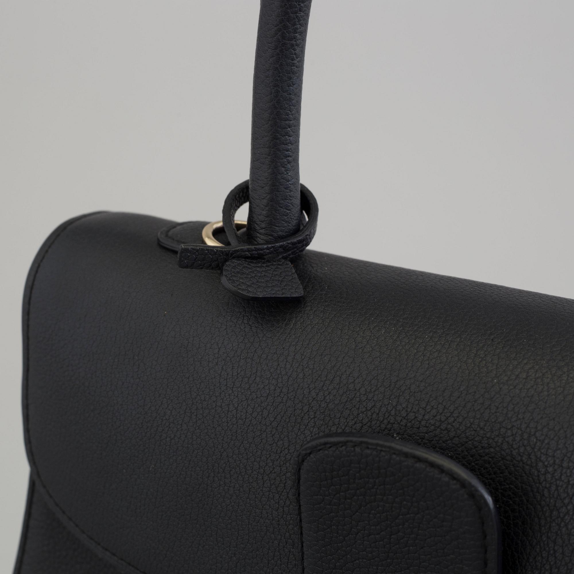 A Delvaux "Brillant" ladies handbag in black colored leather.