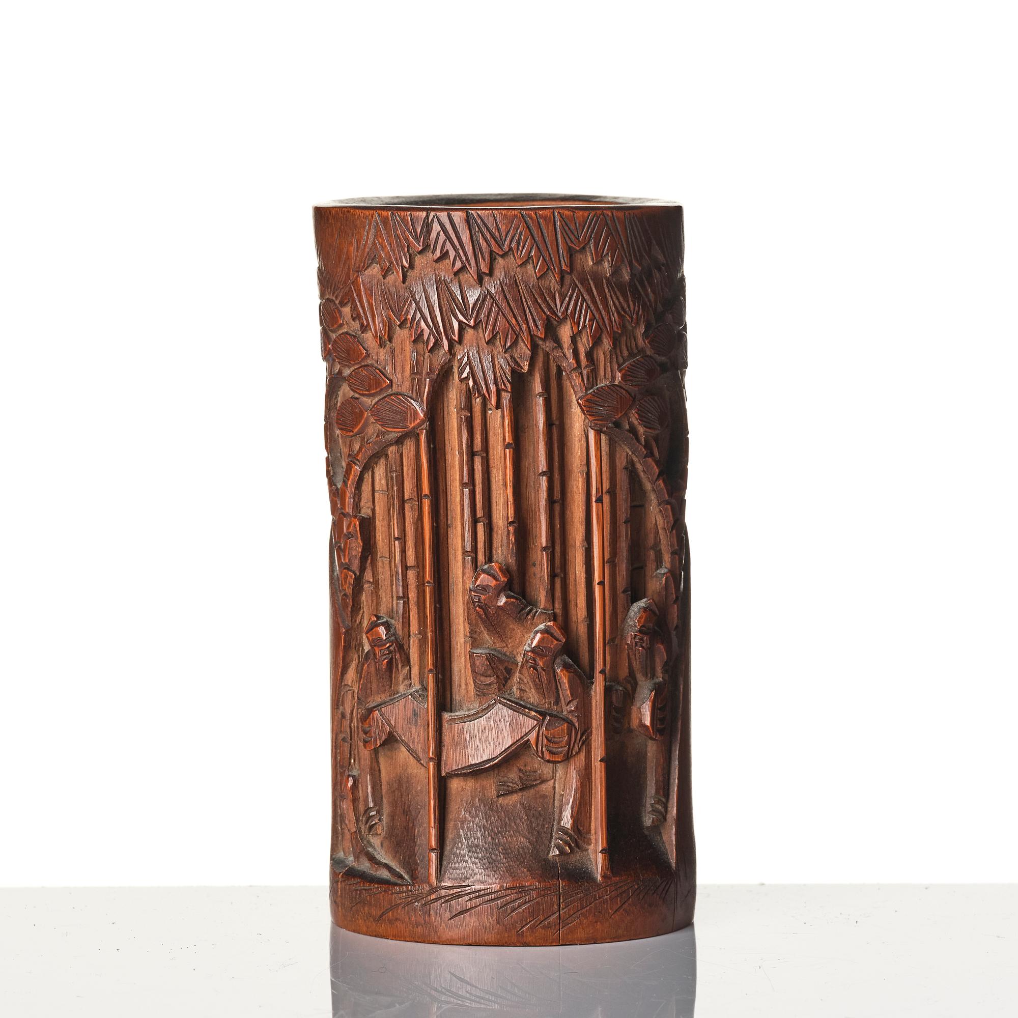 A Chinese brushpot, Qing dynasty, circa 1900. An archaistic bronze ewer and a silvered South East Asian bowl with stand.